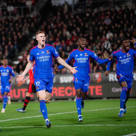 OL players celebrating a goal.