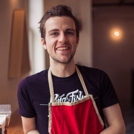 Man wearing an apron.