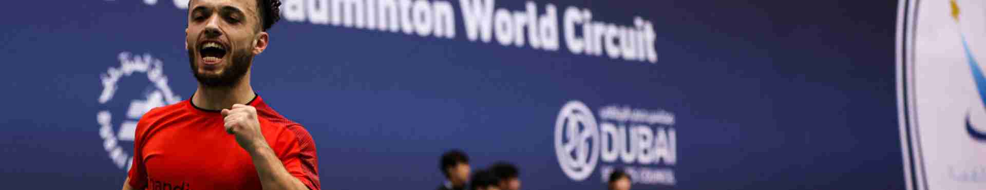 Charles Noakes celebrates winning a match at the Dubai Para Badminton Championships.